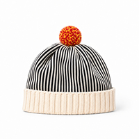 Bonnet en tricot à pompon rayé et à revers, doux et tendance pour l'hiver, pour femmes