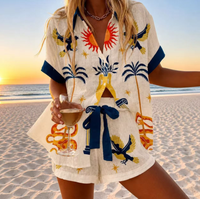 Ensemble deux pièces pour femme, style vacances à la plage transfrontalières, avec chemisier fleuri et haut imprimé à manches courtes pour l'été et l'automne