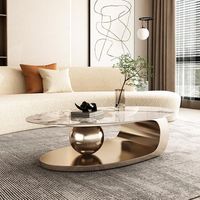 Table basse de luxe ovale en acier inoxydable avec plateau en marbre doré pour la maison