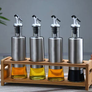 Bouteilles distributrices rondes <span class=keywords><strong>d</strong></span>'<span class=keywords><strong>huile</strong></span> de cuisson de Sauce de cuisine en verre <span class=keywords><strong>Olive</strong></span> avec <span class=keywords><strong>bec</strong></span> <span class=keywords><strong>verseur</strong></span> en acier inoxydable vente en gros - Product Image 5