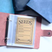 Album de collection de graines avec pochettes de rangement pour économiser l'espace et protéger les enveloppes