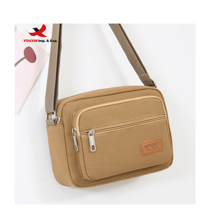 กระเป๋าผ้าแคนวาสสะพายข้างผู้ชายแบบมินิ RTS สั่งซื้อแบบรวมหลายรายการ กระเป๋าสะพายข้างแบบสั่งทำพิเศษ กระเป๋าสะพายข้างแบบสปอร์ต - Product Image 1
