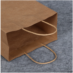 Qualité supérieure vente en gros d'épicerie pliable <span class=keywords><strong>pas</strong></span> <span class=keywords><strong>cher</strong></span> <span class=keywords><strong>kraft</strong></span> brun personnalisé shopping <span class=keywords><strong>sac</strong></span> en papier avec poignées - Product Image 2