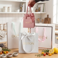 Coated Paper Luxury Gift Paper Bag with Matt Lamination Long Ribbon Handle Suitable for Cosmetics