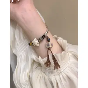 Luxury tassel charm bracelet adjustable leather woven bracelet with 925 silver charm ceramic charm