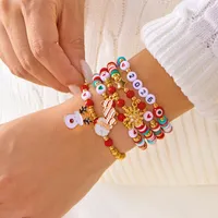 Ensemble de 4 bracelets en perles d'argile polymère, sapin de Noël, Père Noël, cerf, flocon de neige, bijoux pour femmes, bracelets à breloques multicouches