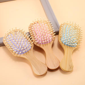 หวีไม้ไผ่แบบพกพาขนาดเล็ก คลาสสิก ป้องกันไฟฟ้าสถิตย์ สำหรับจัดแต่งทรงผมและดัดผมที่บ้าน พร้อมดีไซน์นวดเส้นลมปราณ - Product Image 1