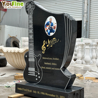 Tombeau de pierre tombale de guitare en marbre noir de cimetière simple