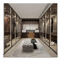 Meuble de dressing de luxe avec armoire intégrée en verre fumé et cadre en aluminium pour hôtel