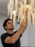 Lustre ovale en laiton et cristal de style américain, télécommande, hauteur réglable, utilisation hôtelière, design moderne, tailles personnalisées disponibles