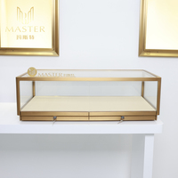 Vitrina de Exhibición Elegante MASTER con Marco Metálico Dorado y Vidrio Templado, Gabinete para Joyería con Diseño Antirrobo, Vitrina Personalizada