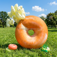 Nouveau design géant de beignet bagel doré brun gonflable, texture réaliste de pain, forme annulaire, pour affichage publicitaire d'événements alimentaires en extérieur