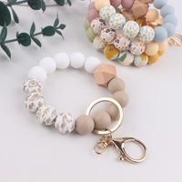 Meistverkauftes Eichenholz Unregelmäßig Gewebtes UV-Bedrucktes Baumwoll-Perlen-Münzhalter Schlüsselanhänger Armband