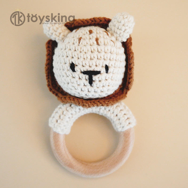 Campana de mano de león beige