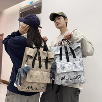 Sac à dos à enroulement grande capacité en nylon avec fermeture éclair, pour hommes et femmes, idéal pour les voyages et l'école, avec pendentif grenouille en peluche, sac quotidien unisexe en polyester