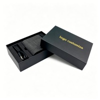 Boîte cadeau personnalisée écologique en forme de livre noir mat en deux parties avec dorure à chaud et insert pour appareil photo et électronique grand public
