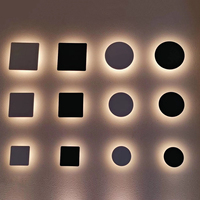 Applique murale LED carrée noire avec éclairage halo doux - Lumière décorative contemporaine