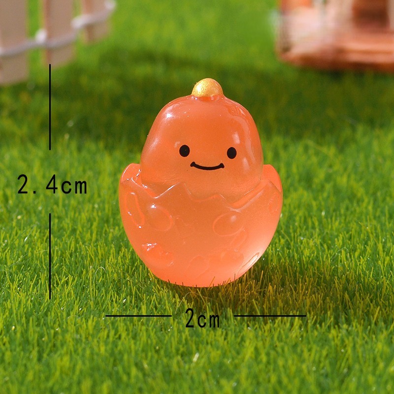 Dinosaure souriant orange lumineux