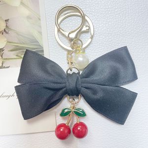 Porte-clés en tissu avec nœud et pendentif cerise pour sac de fille, breloque cerise, porte-clés cerise avec nœud - Product Image 5