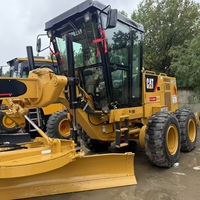 Niveleuse à moteur CAT d'occasion de haute qualité, engin de construction d'origine, en bon état, vendue à bas prix.