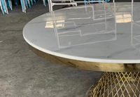 Table à manger ronde avec base en acier inoxydable et dessus en marbre pour les mariages
