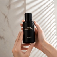 Flacon de parfum en verre portable de 30 ml en forme de cylindre avec couvercle magnétique, atomiseur de luxe de 50 ml et 100 ml, flacon de parfum vaporisateur avec boîte personnalisée