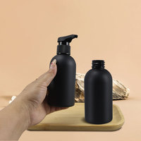Bouteille ronde Boston noire givrée en PET de 250 ml, bouteille en plastique avec bouchon à disque, emballage pour shampoing, lotion corporelle, soin des cheveux, finition mate