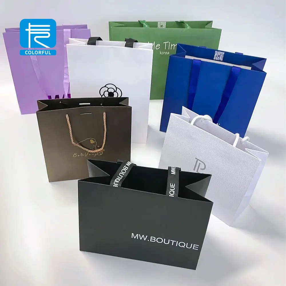 Sacos de papel de compras de luxo para presente de oferta personalizado Oem preço de atacado embalagem para velas com seu próprio logotipo