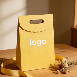 Custom Kraft Paper Bags with Diecut Handles and Personalized Designs Are the Ideal Choice for <b>Packaging</b> Jewelry and Handicrafts. - Product Image 4