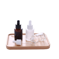 Flacon compte-gouttes cylindrique à épaule plate en verre ambré transparent ou dépoli de 1 oz (30 ml) pour sérum et huile essentielle