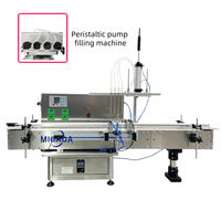 Ligne de production automatique de remplissage et de bouchage pour bouteilles rondes de whisky, de liqueur, de savon liquide, avec désaggrégateur de bouteilles