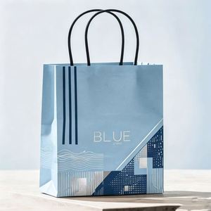 Sacs d'emballage cadeau de luxe en papier brillant avec logo personnalisé pour les événements de boutiques - Product Image 1