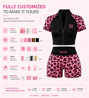 Ensemble de yoga color block imprimé léopard respirant sans couture avec haut court zippé à manches courtes et short push-up personnalisé pour femme