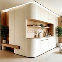 Armoire de couloir bicolore beige en bois composite naturel avec plusieurs tiroirs, finition lisse à bords courbes et miroir