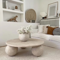 Table basse italienne minimaliste de luxe léger avec base sphérique, design circulaire moderne et créatif
