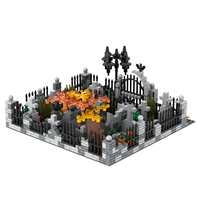 Ensemble de blocs de construction sur le thème de l'Halloween : cimetières, tombes, têtes de citrouille, croix et jouets inclus