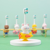 Brosse à dents pour enfants en gros d'usine avec poils ultra-doux personnalisés, manche en PP coloré, brosse à dents pour enfants pour les soins bucco-dentaires