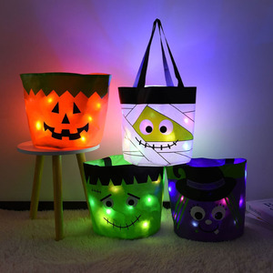 Cesta de Halloween Personalizada con Diseño de Calabaza Luminosa, Cubo para Dulces de Halloween para Niños, Cestas de Halloween de Tela que Brillan en la Oscuridad - Product Image 1