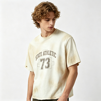 T-shirt sportif vintage délavé effet soleil pour homme, en coton épais et vieilli, coupe oversize, avec motif graphique, vente en gros