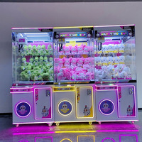 Machine à pince à poupées commerciale très populaire, entièrement transparente, grande, en plastique, avec construction robuste, à monnayeur, pour aire de jeux, dotée d'un clip de suspension, garantie 1 an