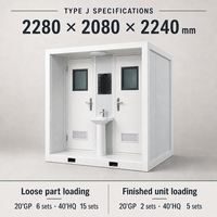 Cabine de toilettes portable blanche à double porte avec lavabo central pour les installations extérieures