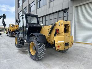 Chariot télescopique diesel CAT Th414 4x4 tout-terrain avec pneus pneumatiques, commande assise, mât à deux étages et déplaceur latéral hydraulique - Product Image 2
