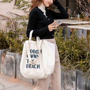 Bolsas de Compras de Lona de Algodón Blanca con Logotipo Personalizado Reciclado Promocional al por Mayor, Bolsas de Mano con Impresión de Letras para Estudiantes Universitarios - Product Image 4