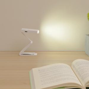 2024 brillo ajustable Clip-On Book Light Mini LED <span class=keywords><strong>linterna</strong></span> de libro plegable con lectura cómoda - Product Image 1