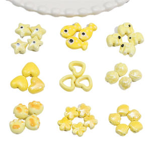 Perle en céramique <span class=keywords><strong>dessin</strong></span> animé jaune amusant perle en céramique <span class=keywords><strong>dessin</strong></span>ée à la main bricolage production accessoires créatifs - Product Image 1