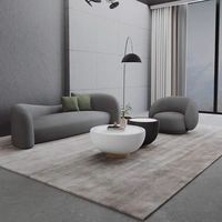 Canapé d'angle trois places en bouclette blanc pour salon – Collection unique