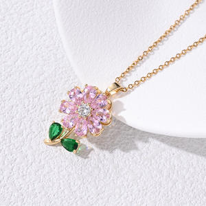 Collier transfrontalier de mode européenne et américaine pour femmes polyvalent fleur à trois pétales oeil de chat conception de pierre zircon rotatif - Product Image 3