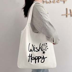 กระเป๋าผ้าแคนวาสแบบเรียบง่ายรักษ์โลกพร้อมหูหิ้วเชือก ใช้ซ้ำได้สำหรับการเดินทางและพิมพ์ลายตัวอักษร - Product Image 3