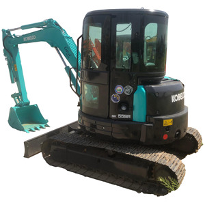 Mini-excavatrice sur chenilles d'occasion KOBELCO SK55SR 5 tonnes, modèle 2023, pour travaux de terrassement et de construction. Composants essentiels : moteur et transmission. - Product Image 1