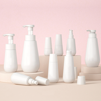Nouveau Design100ml120ml150ml blanc PET bouteille conique cercle bouteille givré couleur presse mousse pompe bouteille en plastique avec boîte en papier